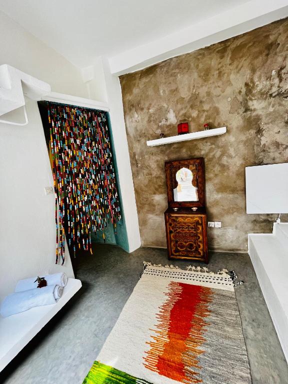 Postel nebo postele na pokoji v ubytování Riad Dar Sebta