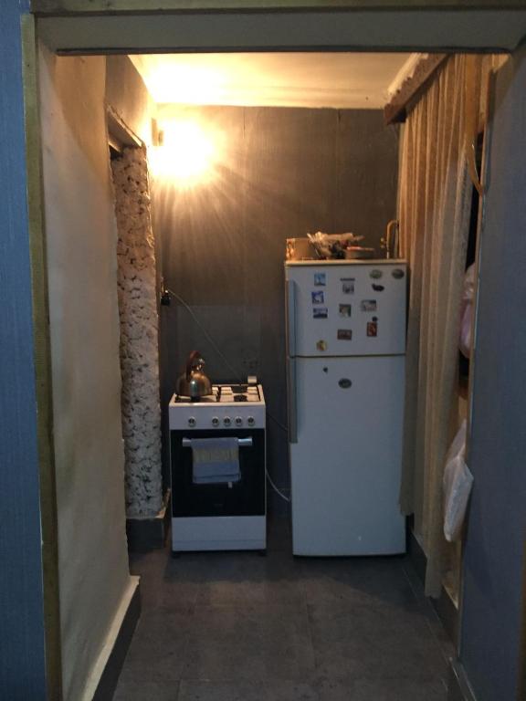 Kuchyň nebo kuchyňský kout v ubytování Mera Hostel