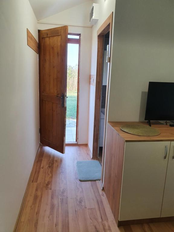 TV a/nebo společenská místnost v ubytování Bungalov Lenka