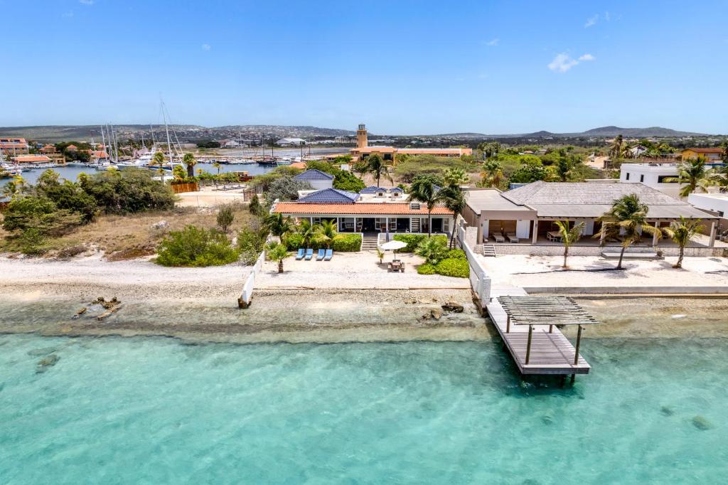 an aerial view of a house on the water at Oceanfront - Villa Port of Call - in Kralendijk