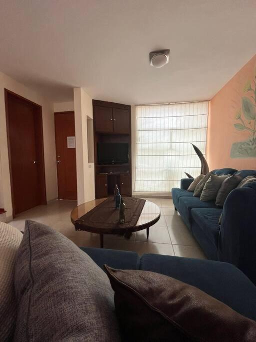 Posezení v ubytování Casa llena de vida y estilo en un conjunto con vigilancia céntrico en Puebla