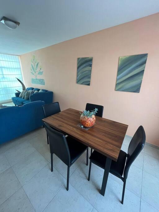 Posezení v ubytování Casa llena de vida y estilo en un conjunto con vigilancia céntrico en Puebla