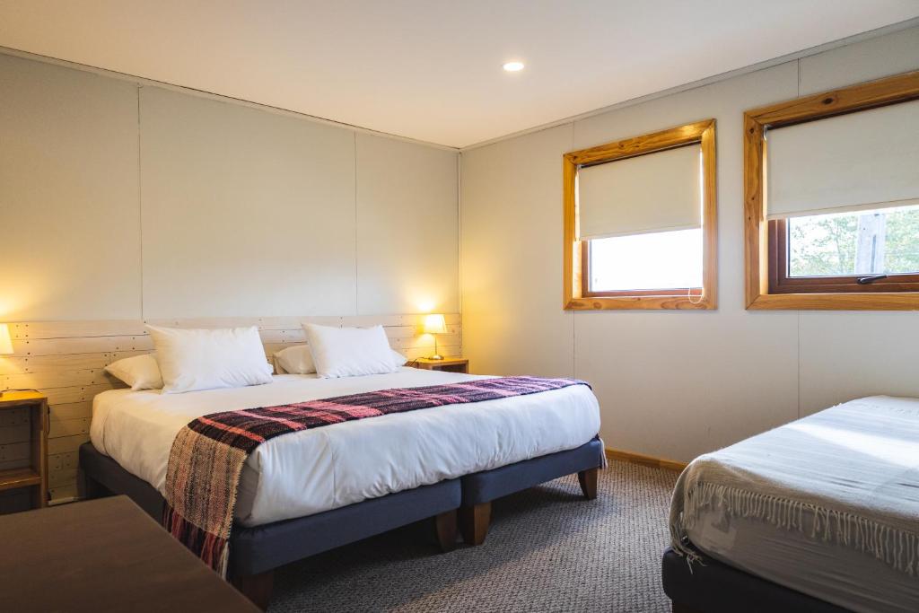 Postel nebo postele na pokoji v ubytování Hotel FioFio SPA