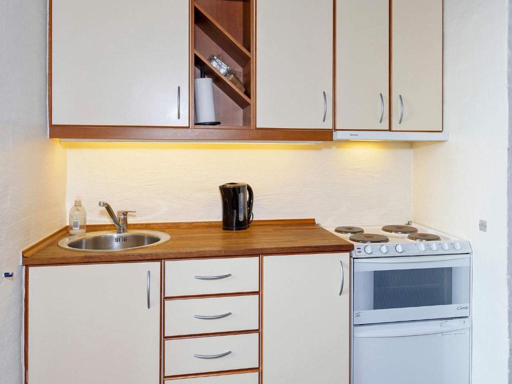 Kuchyň nebo kuchyňský kout v ubytování Apartment Brovst XII