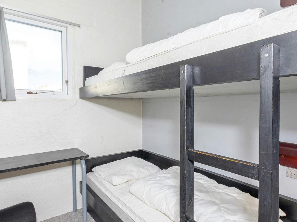 Postel nebo postele na pokoji v ubytování Apartment Brovst XII