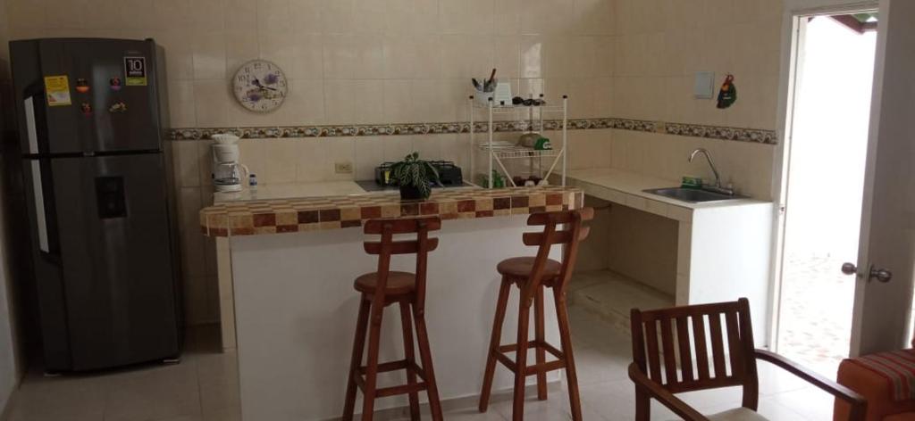 Kuchyň nebo kuchyňský kout v ubytování Hospedaje Casa Pachi en Cartagena de Indias
