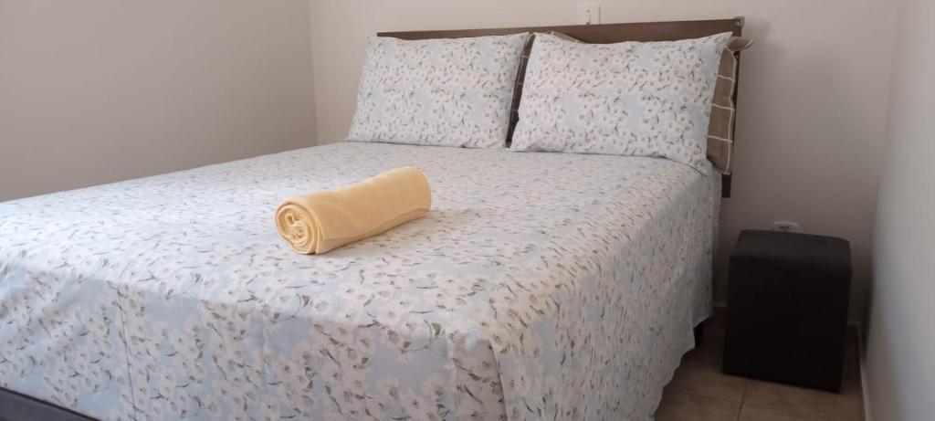 Ένα ή περισσότερα κρεβάτια σε δωμάτιο στο Quarto Hokkaido na Sakura House