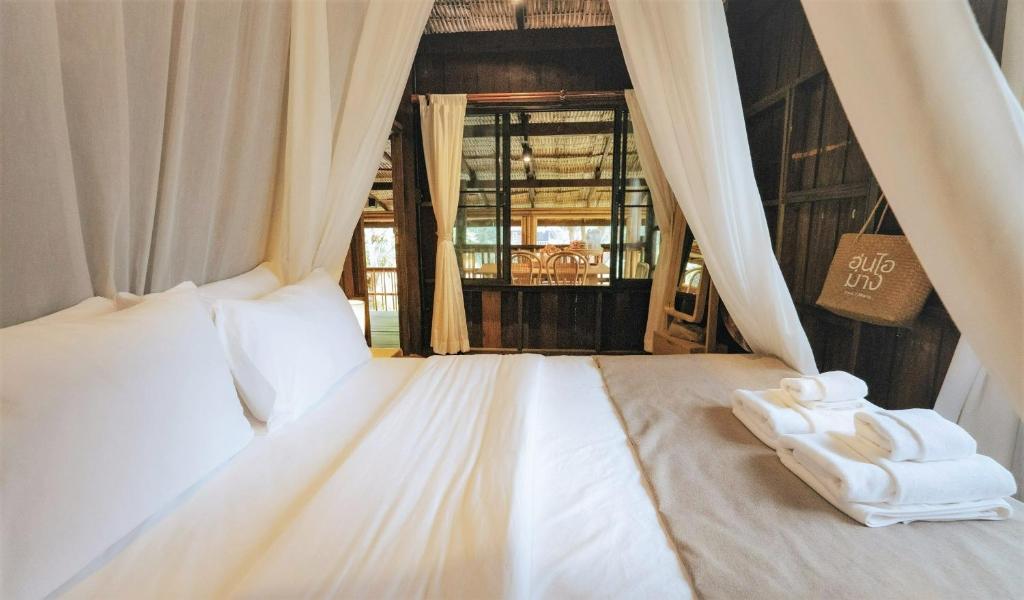 อุ่นไอมาง สะปัน - Camera Familiare