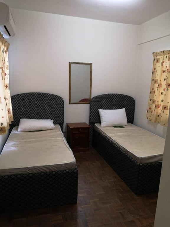 Postel nebo postele na pokoji v ubytování PD Lagoon Resort