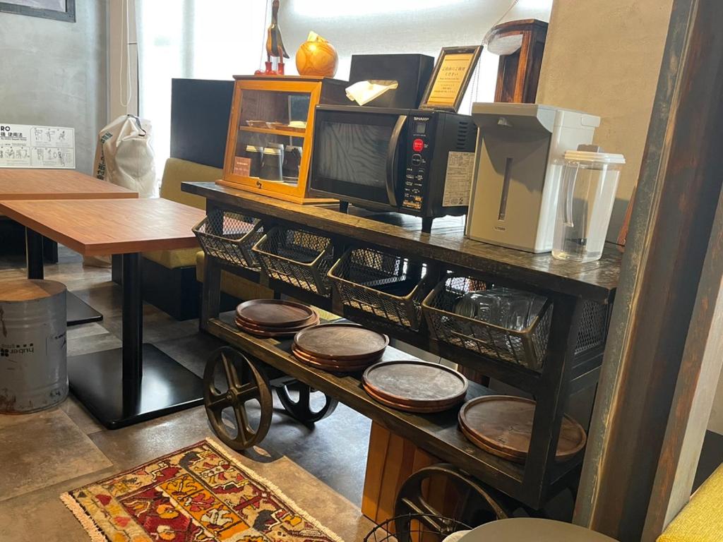 Kuchyň nebo kuchyňský kout v ubytování HARE-TABI SAUNA & INN Yokohama - ハレタビ -