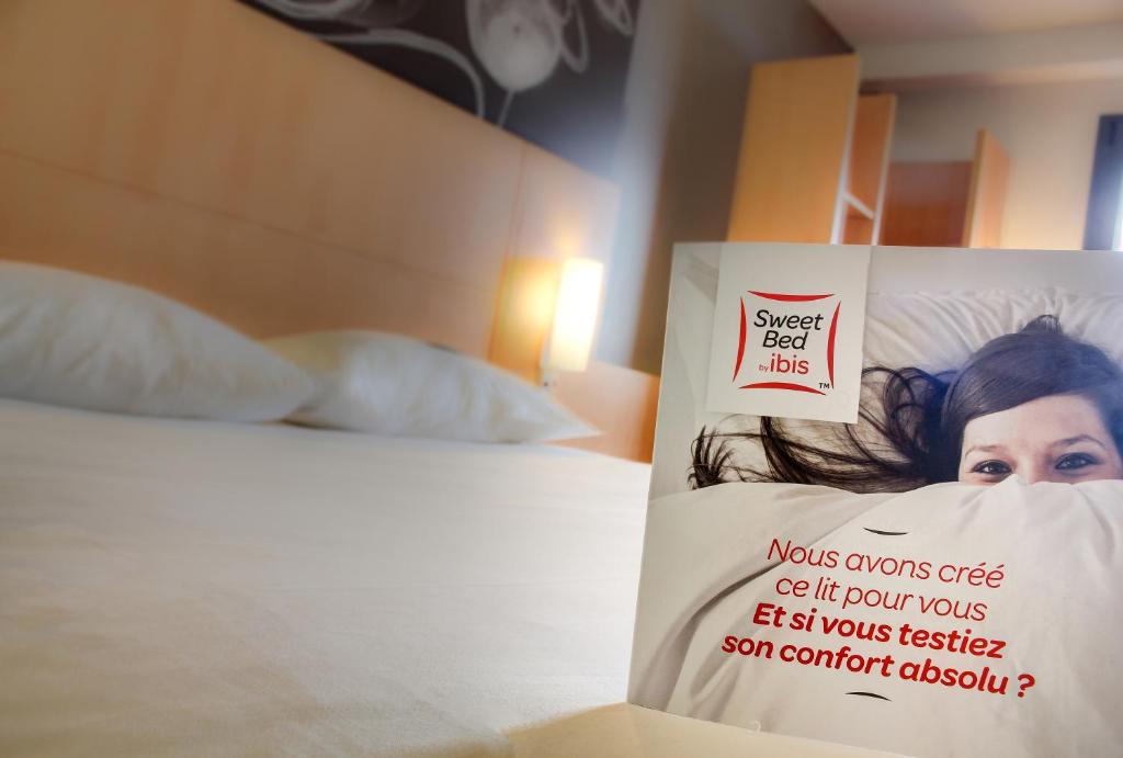 Postel nebo postele na pokoji v ubytování ibis Soissons