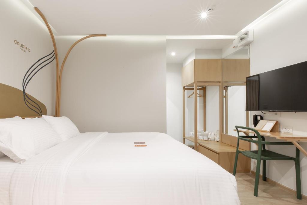 Postel nebo postele na pokoji v ubytování Double B Hostel