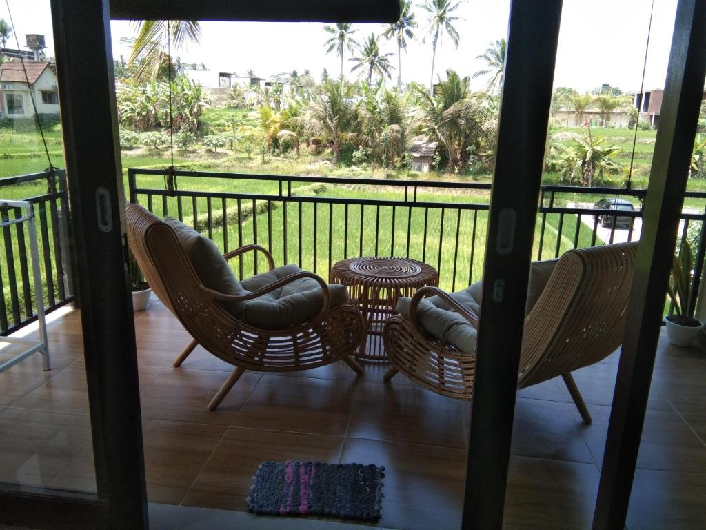 Balkón nebo terasa v ubytování Merta Ubud Homestay