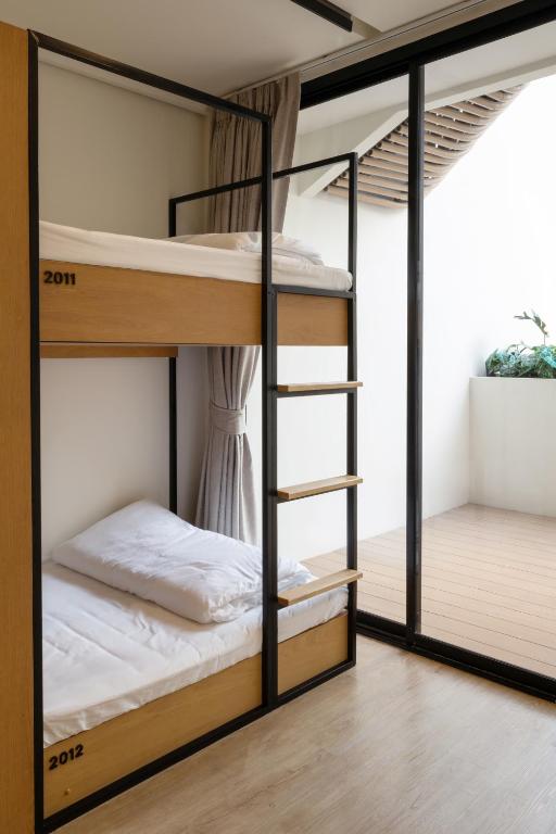 Postel nebo postele na pokoji v ubytování Double B Hostel