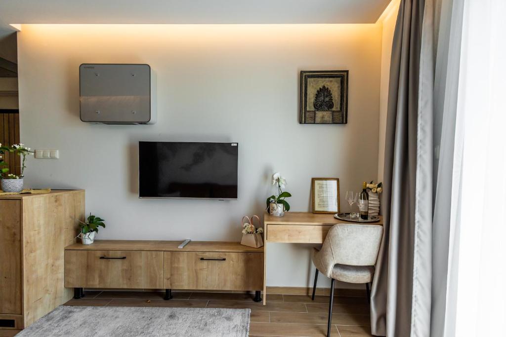 TV a/nebo společenská místnost v ubytování Mokka House Panzió