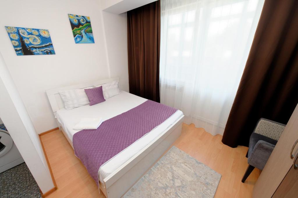Llit o llits en una habitació de Aparthotel Almarent
