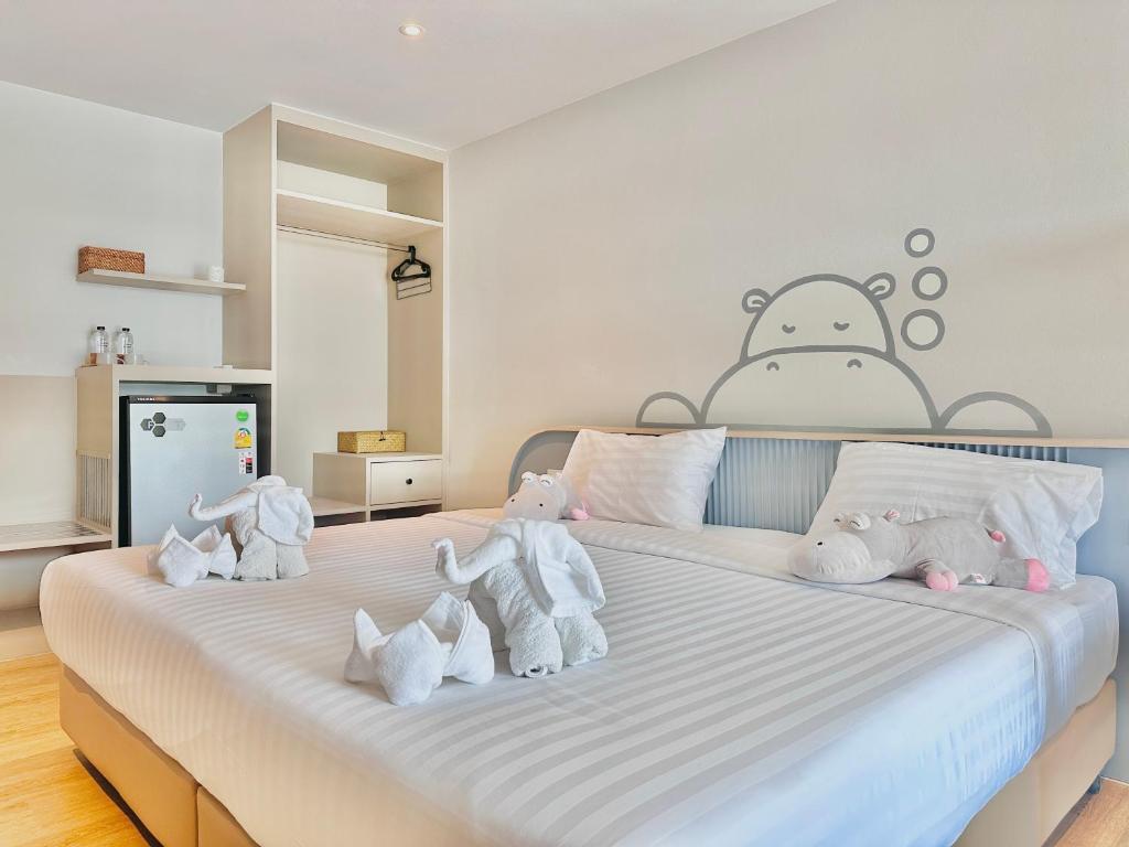 Postel nebo postele na pokoji v ubytování Herma Hotel