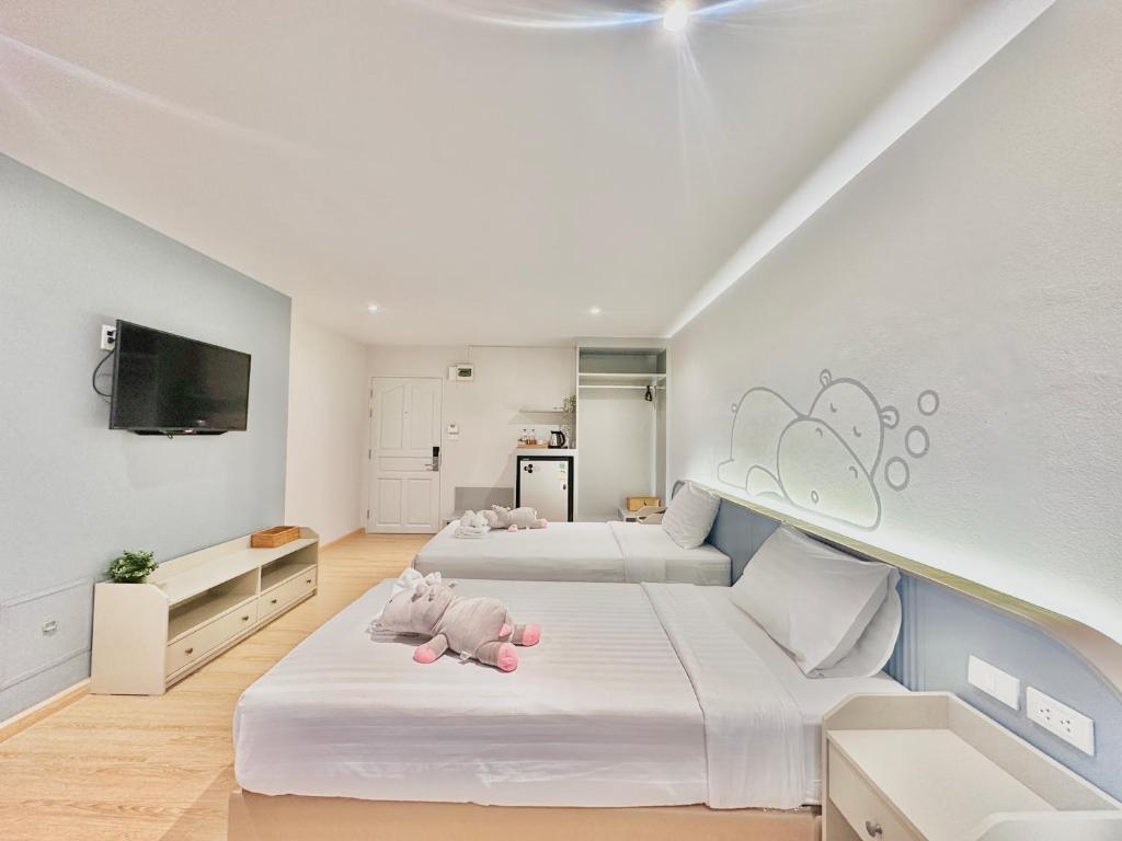 Postel nebo postele na pokoji v ubytování Herma Hotel