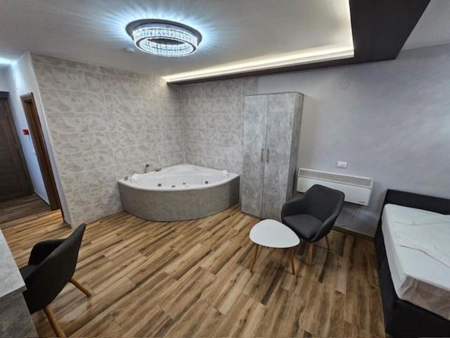 Koupelna v ubytování Olympic Wellness & Spa Hotel