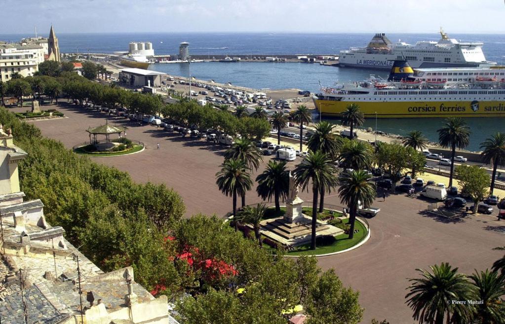 a view of a harbor with a cruise ship in the water at Bastia Room in Bastia