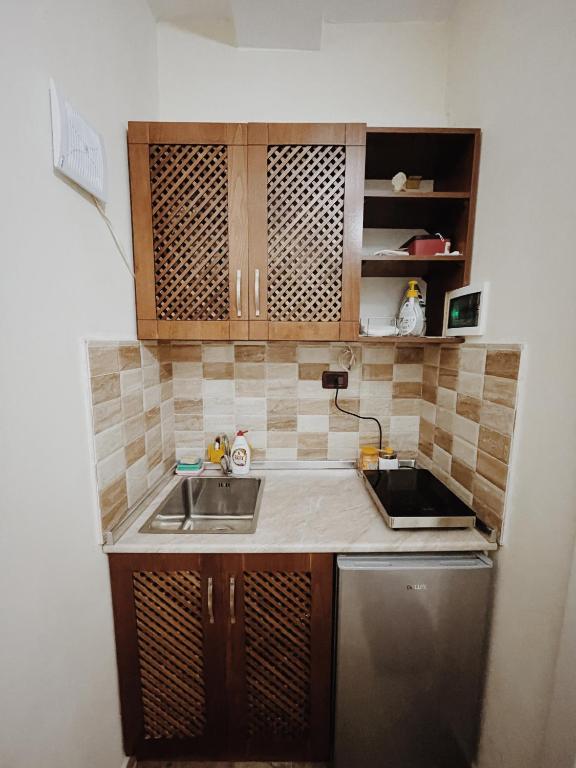 Kuchyň nebo kuchyňský kout v ubytování At Pikotiko's - Korca City Rooms for Rent