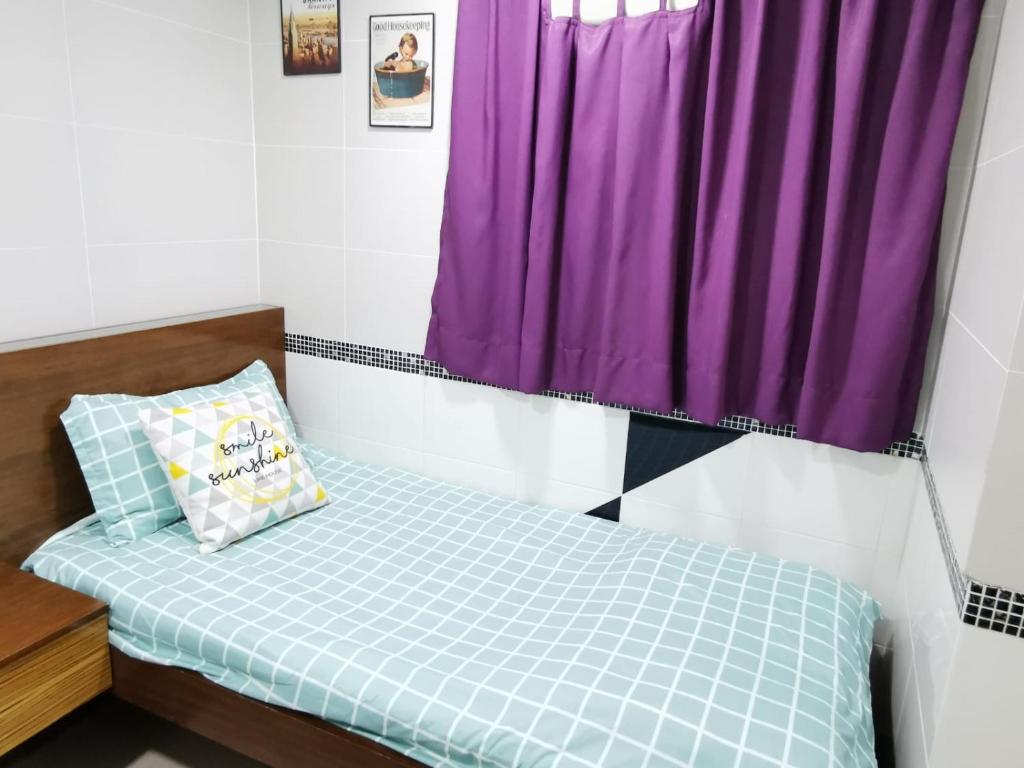 Postel nebo postele na pokoji v ubytování 香港百乐宾馆 Best Guesthouse