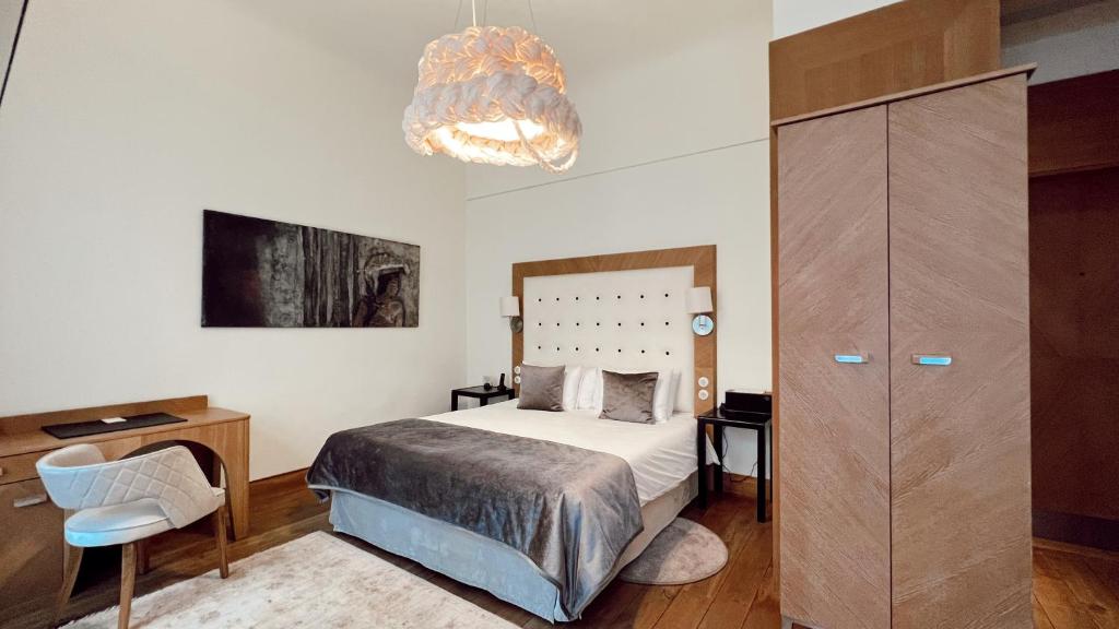 Postel nebo postele na pokoji v ubytování Dome Hotel