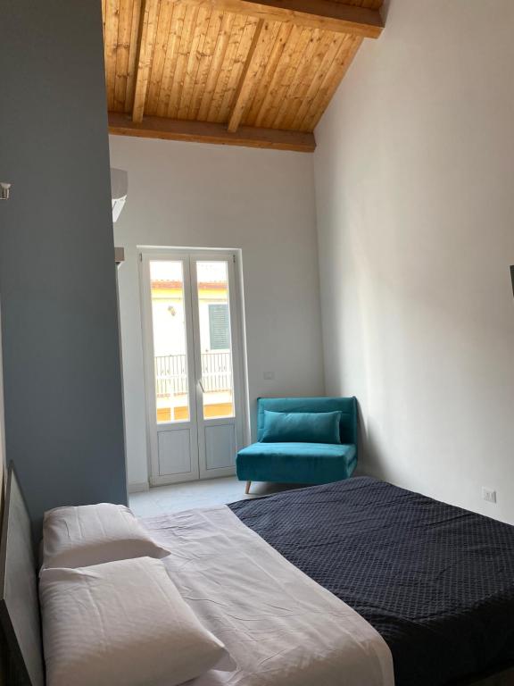 Кровать или кровати в номере Casa Monsù