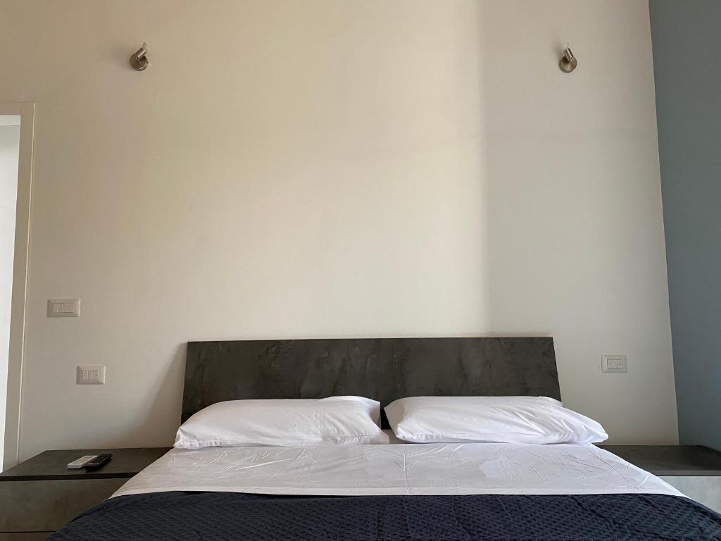 Кровать или кровати в номере Casa Monsù