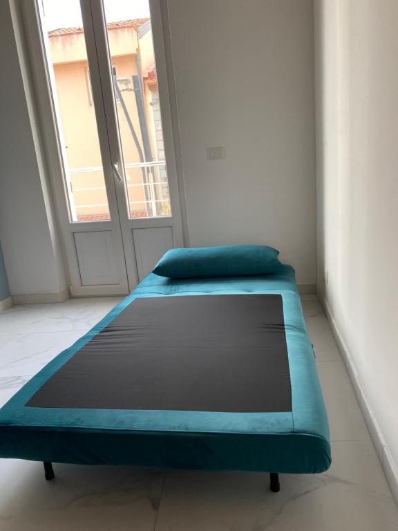 Кровать или кровати в номере Casa Monsù