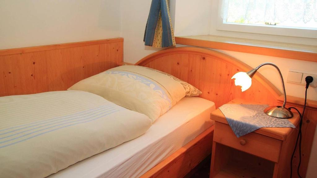Postel nebo postele na pokoji v ubytování Bed and Breakfast Iman