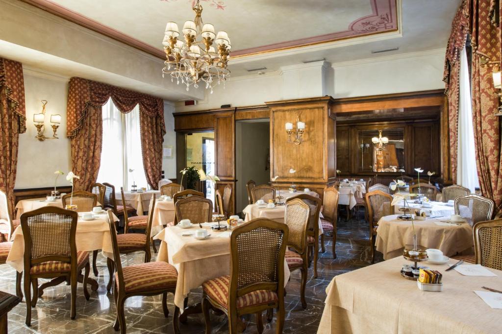 Reštaurácia alebo iné gastronomické zariadenie v ubytovaní Adler Cavalieri Hotel-Private Spa & Gym