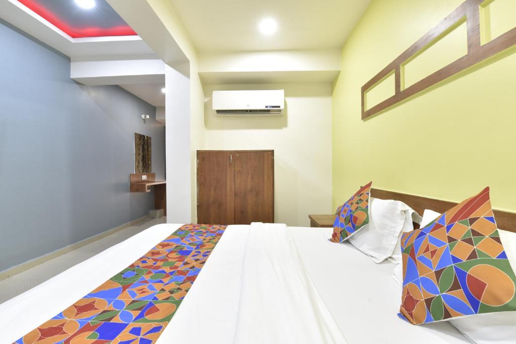Postel nebo postele na pokoji v ubytování HOTEL GOLD LEAF