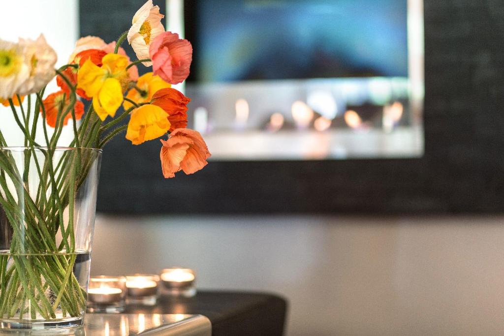 TV a/nebo společenská místnost v ubytování Ganter Hotel & Restaurant Mohren