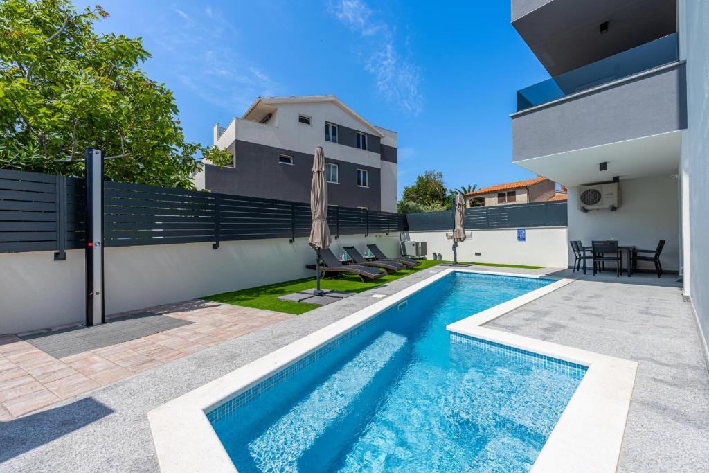 Swimmingpoolen hos eller tæt på Apartment Rose