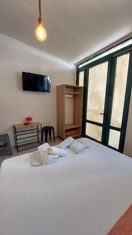 Postel nebo postele na pokoji v ubytování ESCAPE