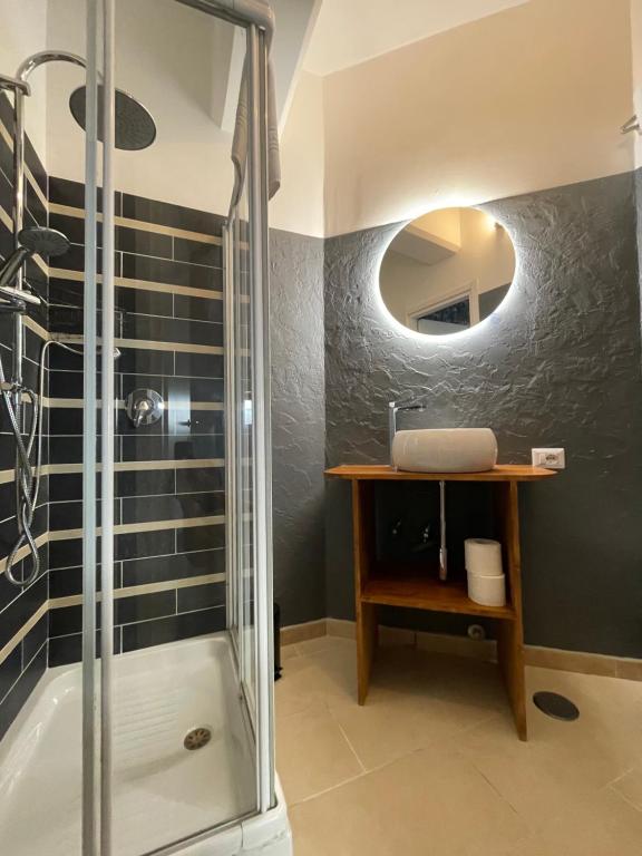 a bathroom with a shower and a sink at civico settee in Rome