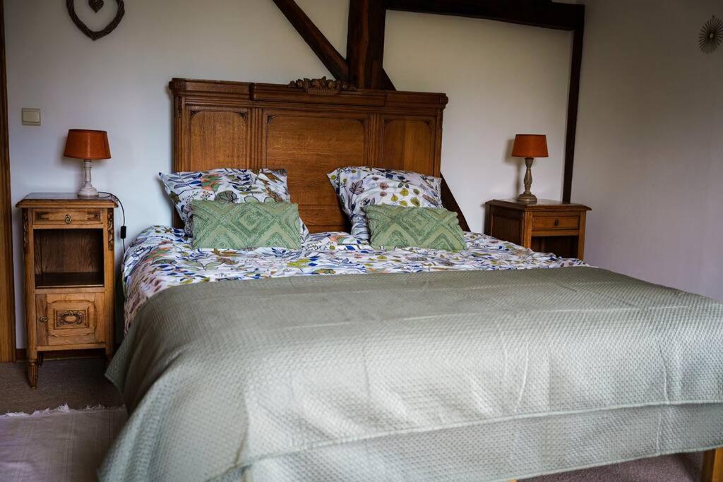 Postel nebo postele na pokoji v ubytování Gite la Dame au Lit gite à la ferme