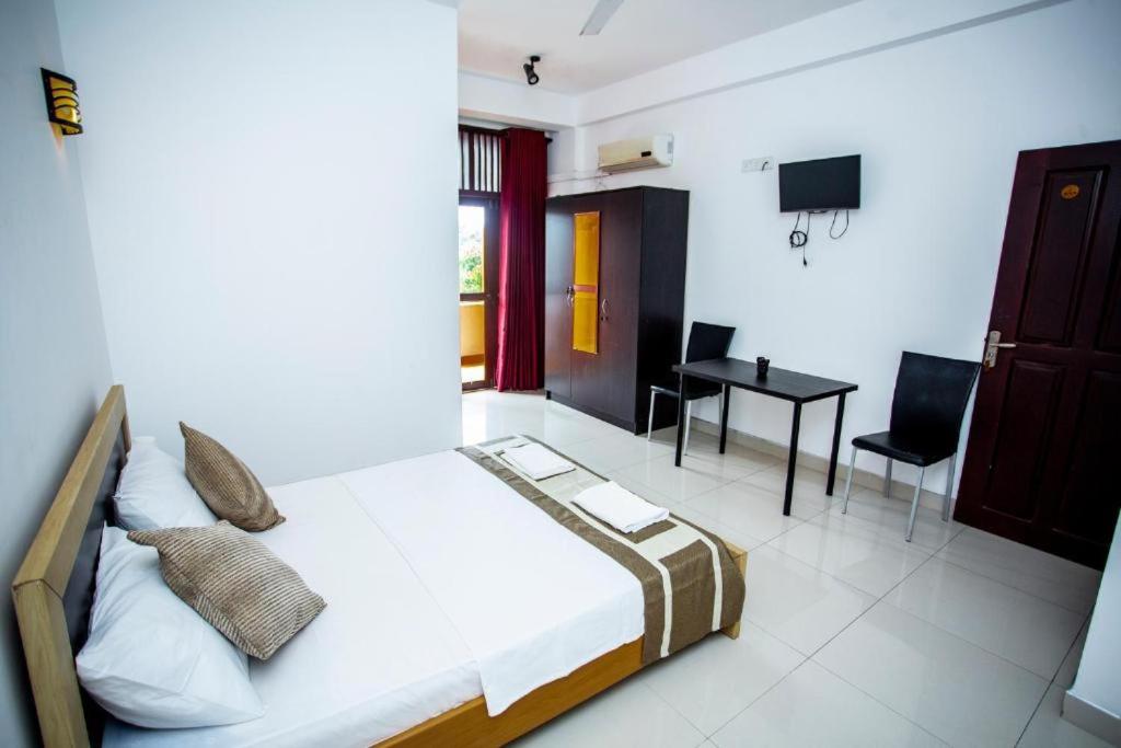 Postel nebo postele na pokoji v ubytování Hotel Blue Bird