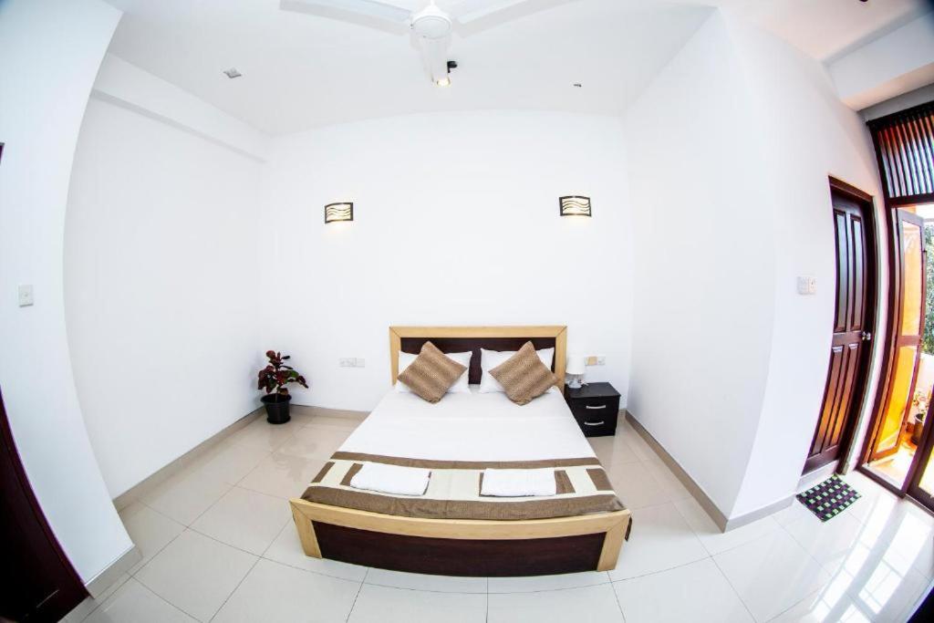 Postel nebo postele na pokoji v ubytování Hotel Blue Bird