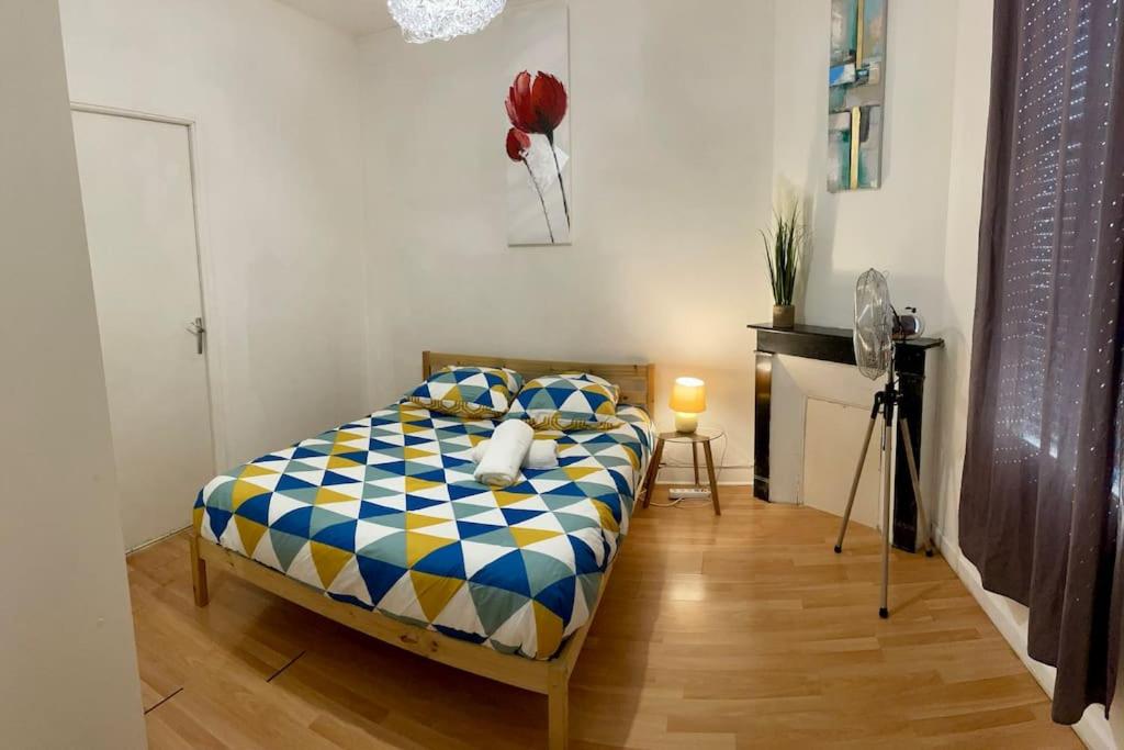 En eller flere senge i et værelse på Apartment T2 Le Mans TGV Station