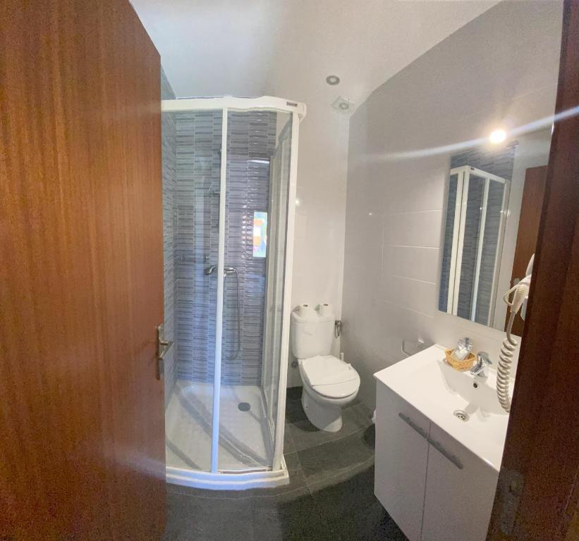 Koupelna v ubytování Hotel Les Roques