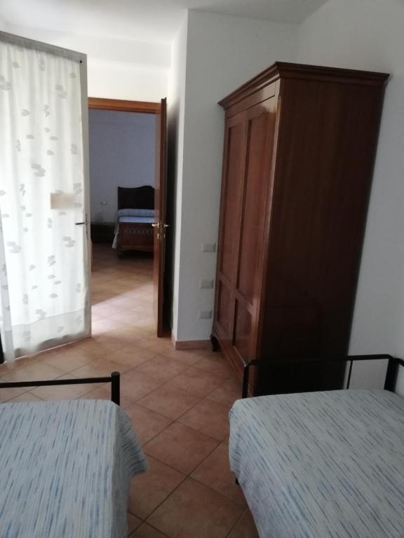 Postel nebo postele na pokoji v ubytování Agriturismo Al Motto
