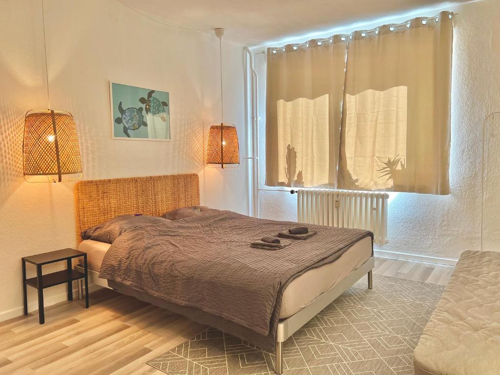 Łóżko lub łóżka w pokoju w obiekcie Mini City Apartment