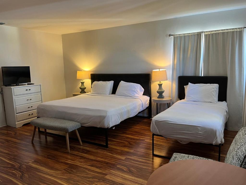 Postel nebo postele na pokoji v ubytování Dee Jay Beach Resort