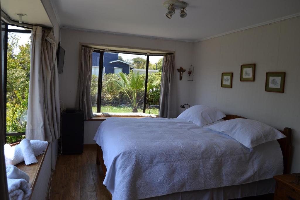 Postel nebo postele na pokoji v ubytování B&B Rocas Santo Domingo