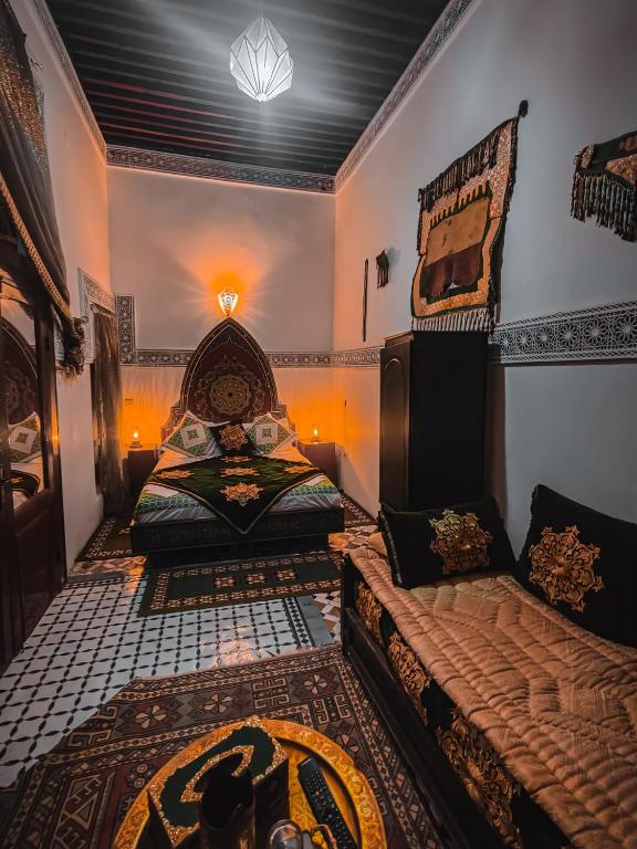 Letto o letti in una camera di Ryad Zahrat Fes