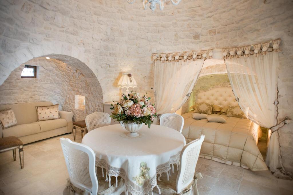 Posezení v ubytování Romantic Trulli