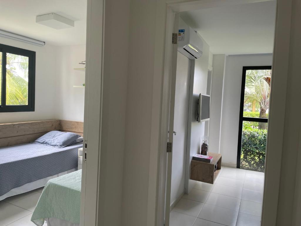 Postel nebo postele na pokoji v ubytování Apartamento no Condomínio Iberostate Praia do Forte