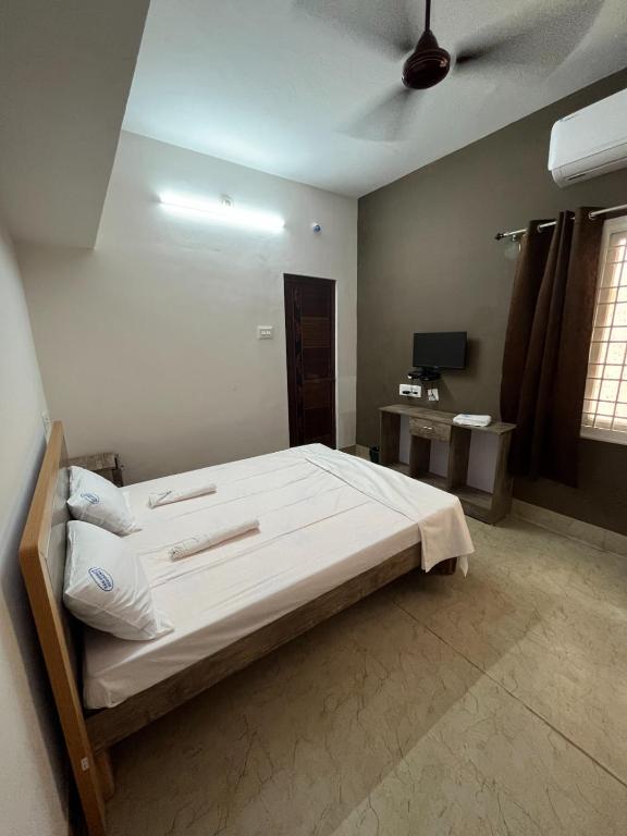 Postel nebo postele na pokoji v ubytování SAN BEACH RESIDENCY